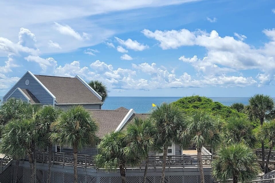 Step onto the master deck and see the Gulf and the clubhouse — this entire resort is yours for the week.