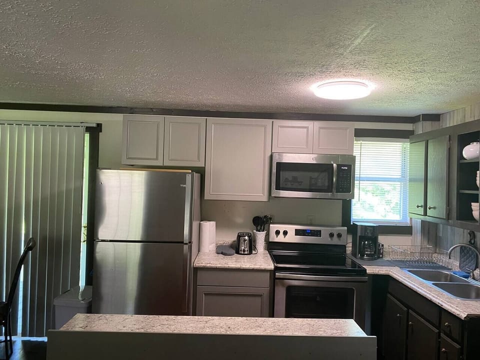 Cute little kitchen has all you need to cook and serve