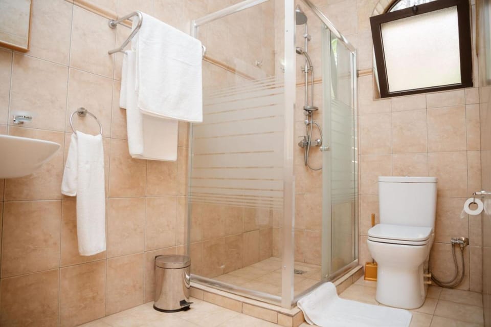 Shower, slippers, towels