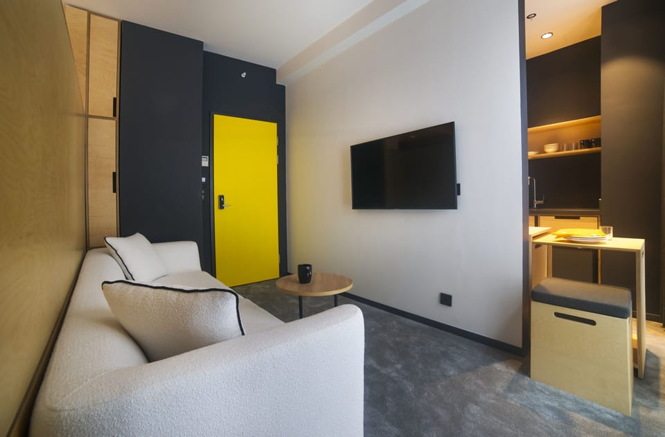 Suite | Living area | 42-inch LCD TV with cable channels, TV