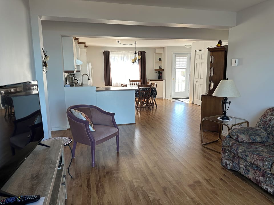 Apartment #3, (2 bedrooms) | Living area | 32-inch TV with cable channels, heated floors