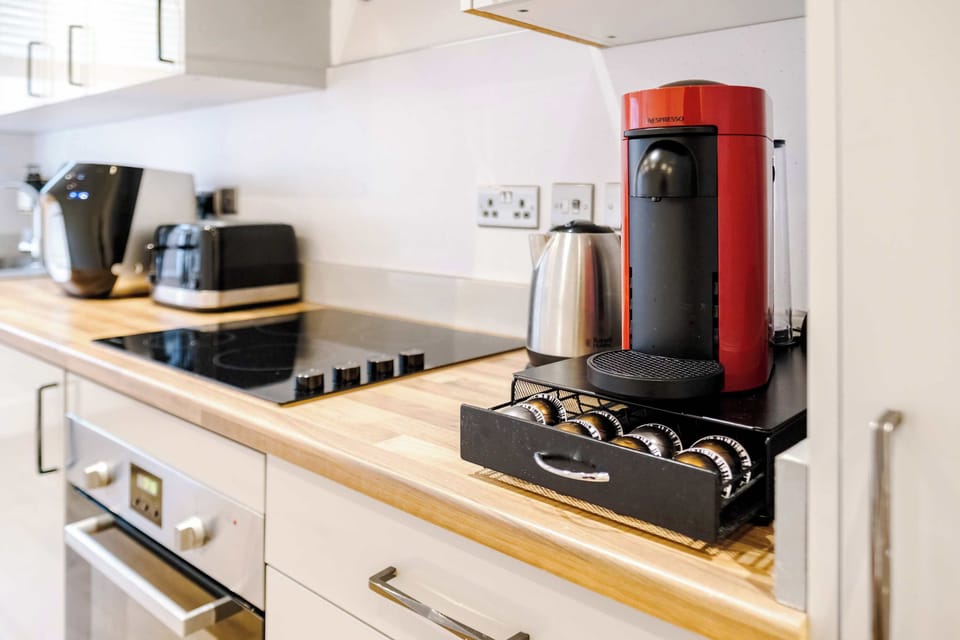 Full Kitchen | Fully equipped with everything you could possibly need, including a fresh filtered water dispenser, dishwasher, washing machine and dryer, a Nespresso machine with pods, plus all the cooking utensils and essentials for preparing meals 