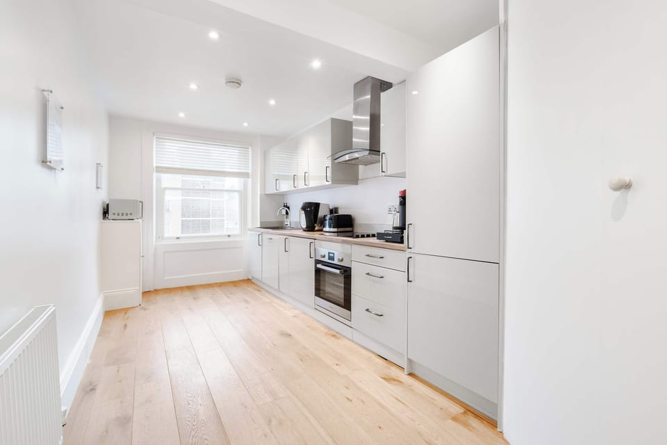 Full Kitchen | Fully equipped with everything you could possibly need, including a fresh filtered water dispenser, dishwasher, washing machine and dryer, a Nespresso machine with pods, plus all the cooking utensils and essentials for preparing meals 