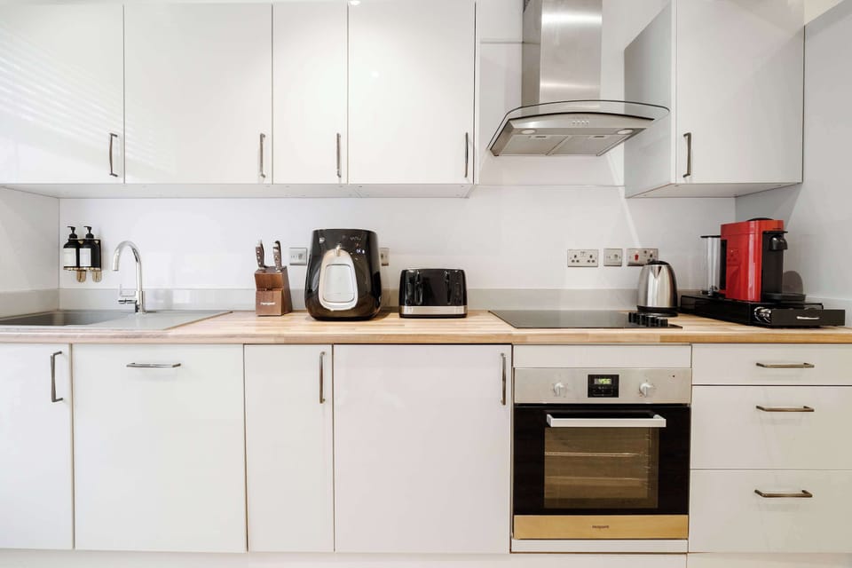 Full Kitchen | Fully equipped with everything you could possibly need, including a fresh filtered water dispenser, dishwasher, washing machine and dryer, a Nespresso machine with pods, plus all the cooking utensils and essentials for preparing meals 