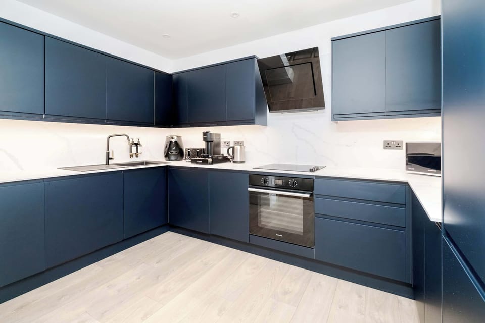 Full Kitchen | Indulge in a fully-equipped kitchen, perfect for any length of stay. Enjoy modern conveniences like a washer, dryer, dishwasher, espresso machine, and a fresh water dispenser.