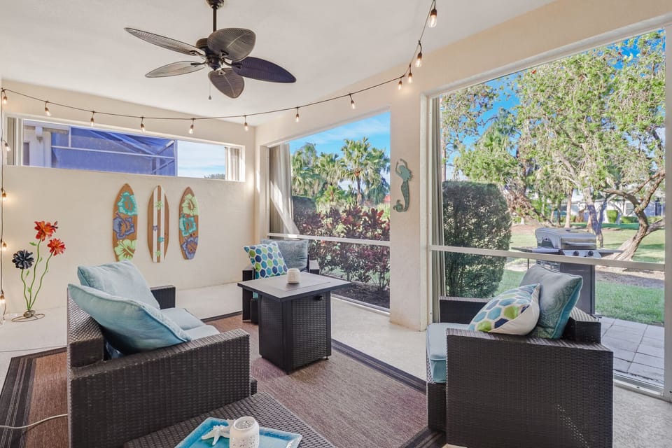All back doors open to this fun lanai which overlooks private common ground.  
