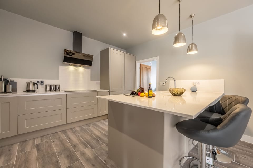 Ground floor: A smart fitted kitchen with breakfast bar