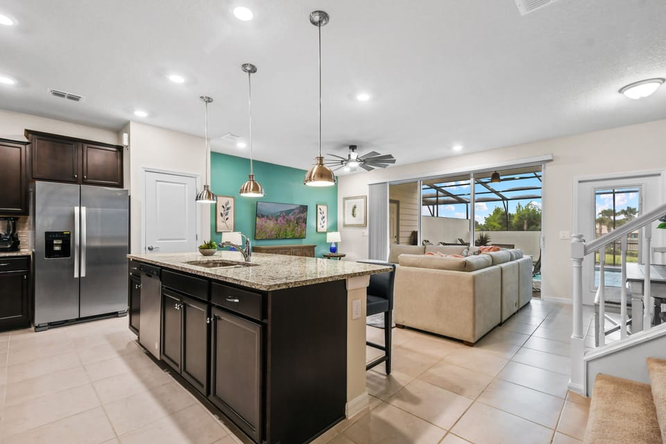 Spacious Downstairs Living Area with Full Size Kitchen and Barstools
