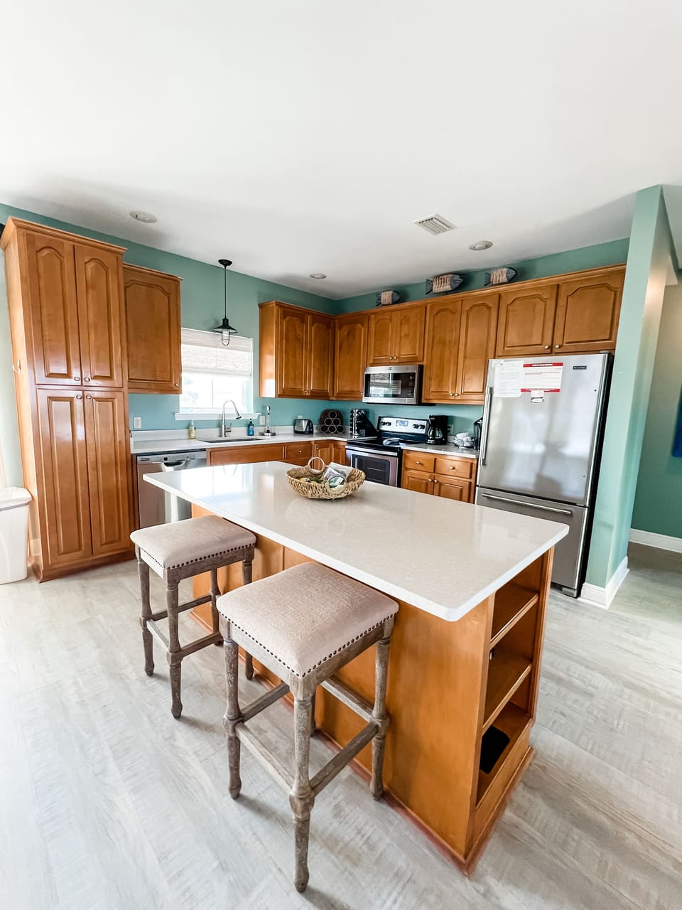 The kitchen is fully stocked with everything you need to stay in
