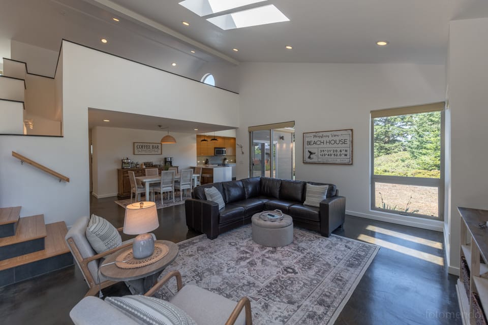 Living room with loft above