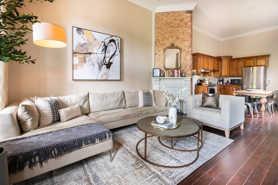 Living room opening to kitchen area