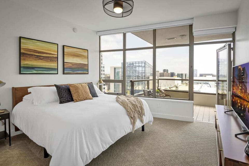Master Bedroom (King Bed) with Ensuite Bathroom and Access to Private Balcony