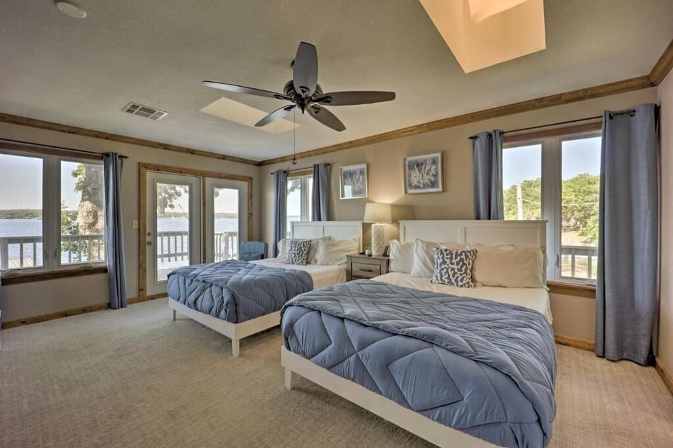 Primary Room with Two Queen Beds, and a chair that converts to child's bed.