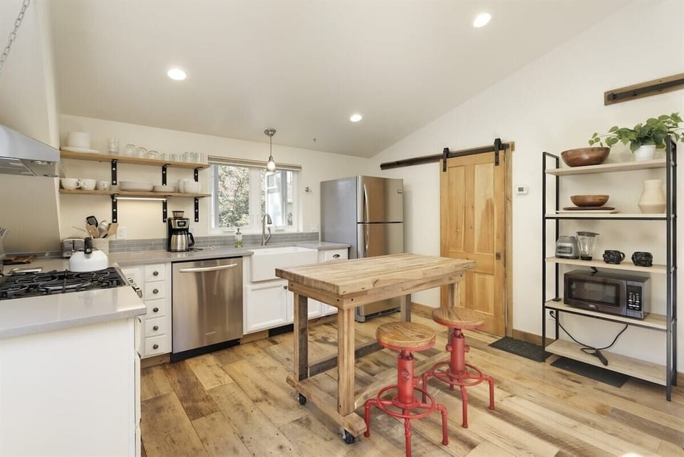 Spacious kitchen with antique sliding doors to your bathroom and master bedroom