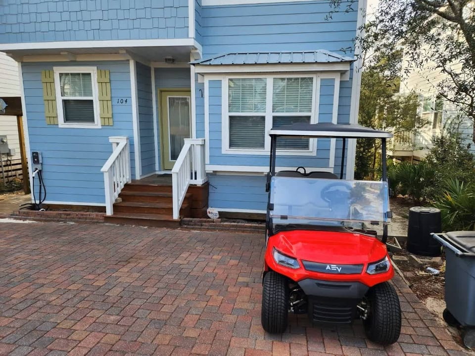 6 person golf cart waiting for you!  Its a great way to get to the beach - 2 minutes from the house.