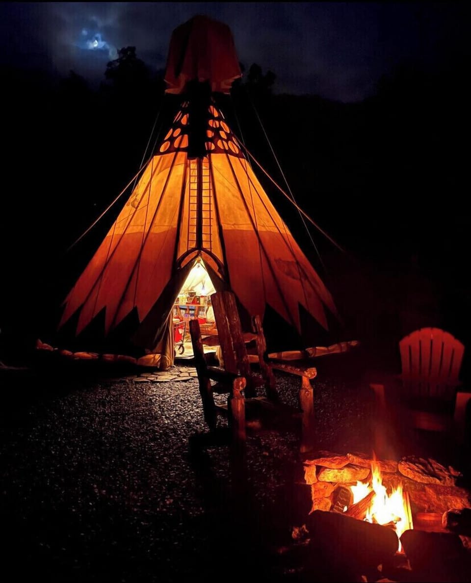 Tipi and fire at night. It’s wonderful to star gaze on a clear night.