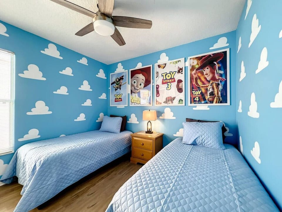 Bedroom #2 with 2 twin beds, decorated in a fun Toy Story theme.