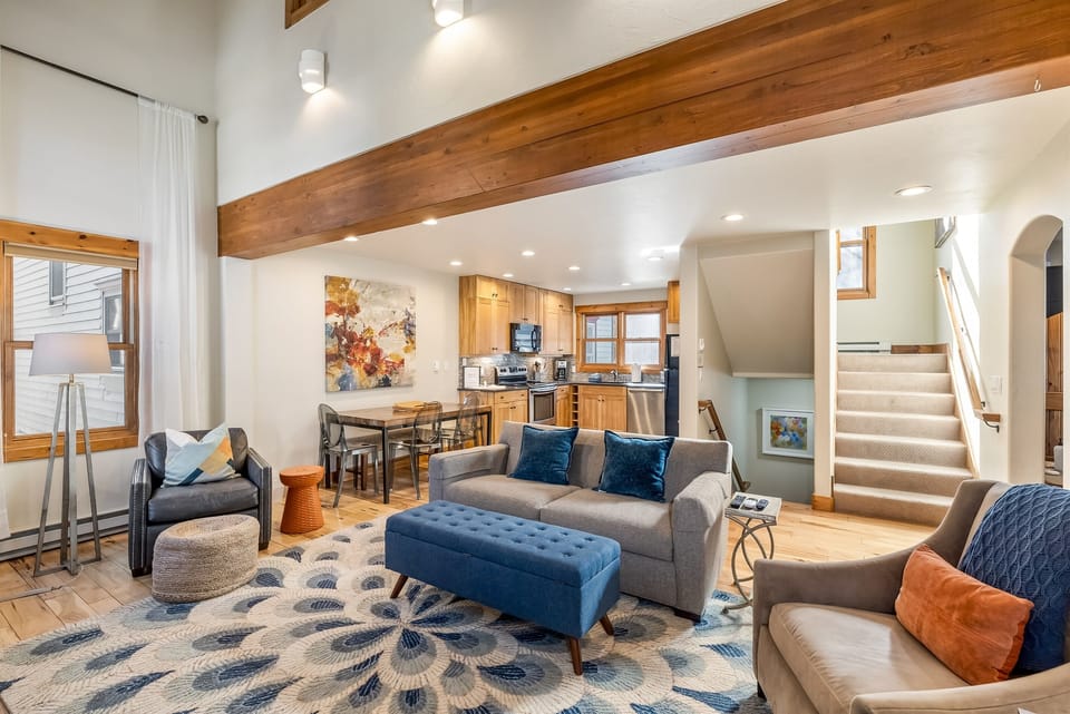 Living room with kitchen in background