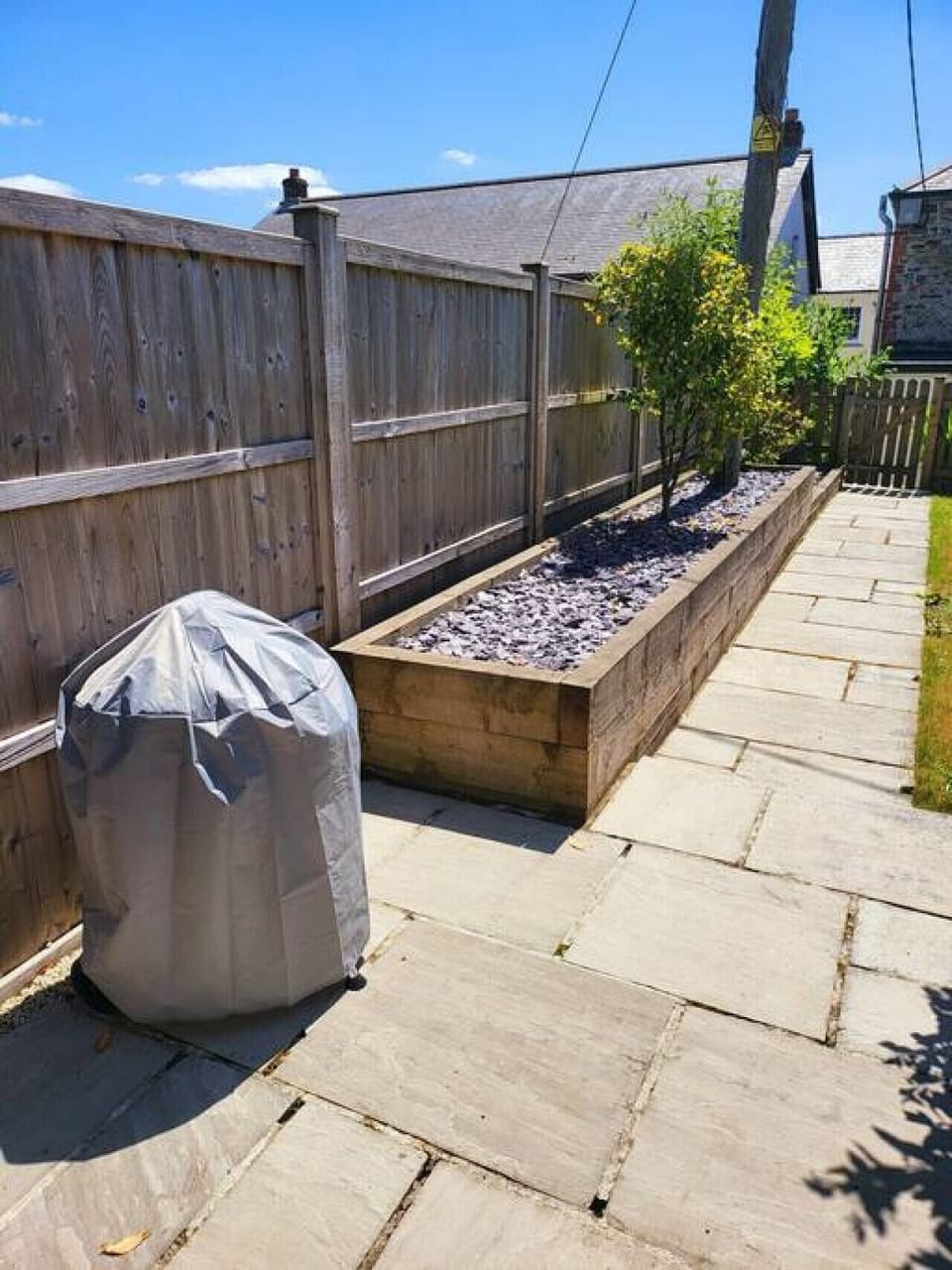 Patio and Barbecue in garden