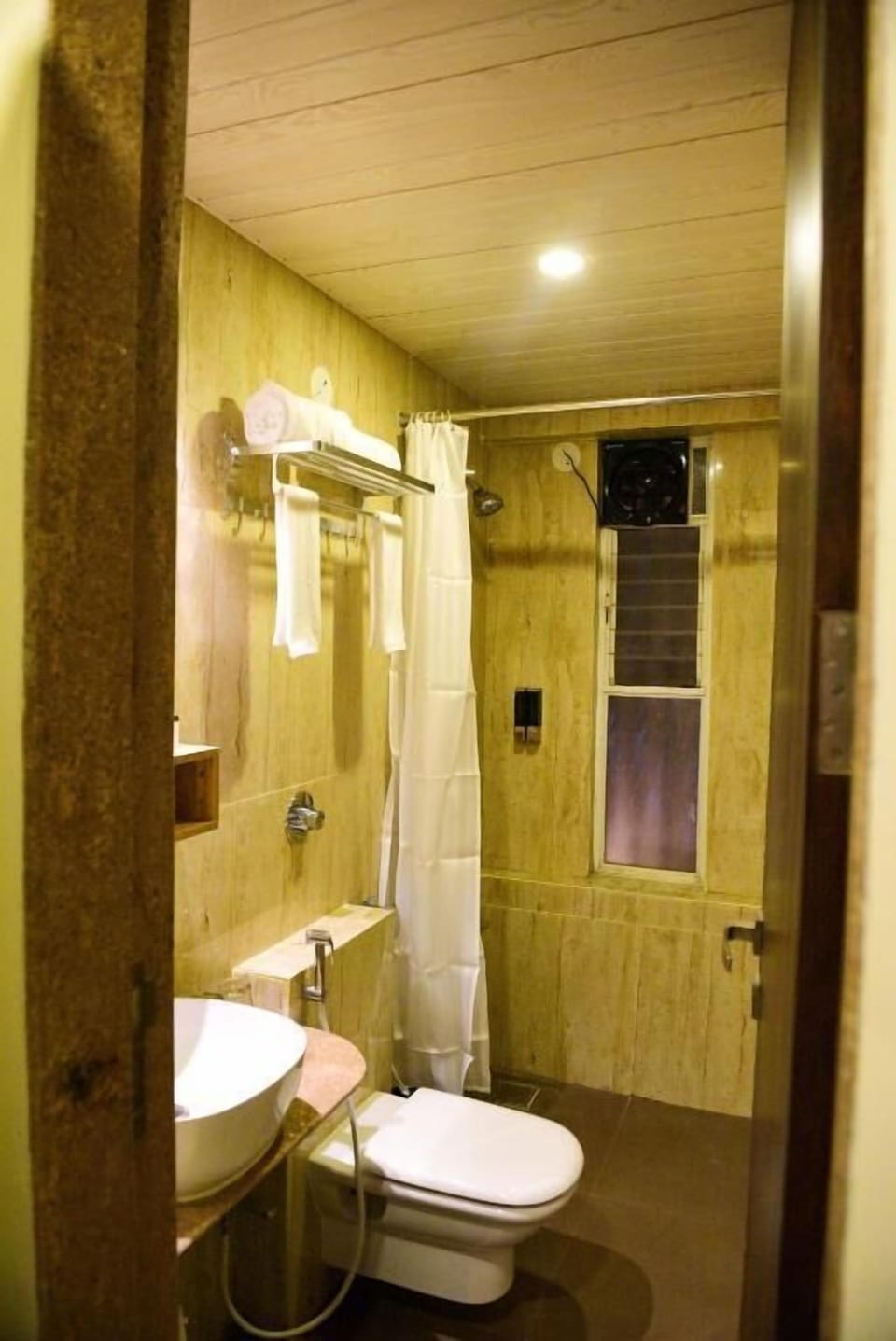 Shower, free toiletries, hair dryer, slippers