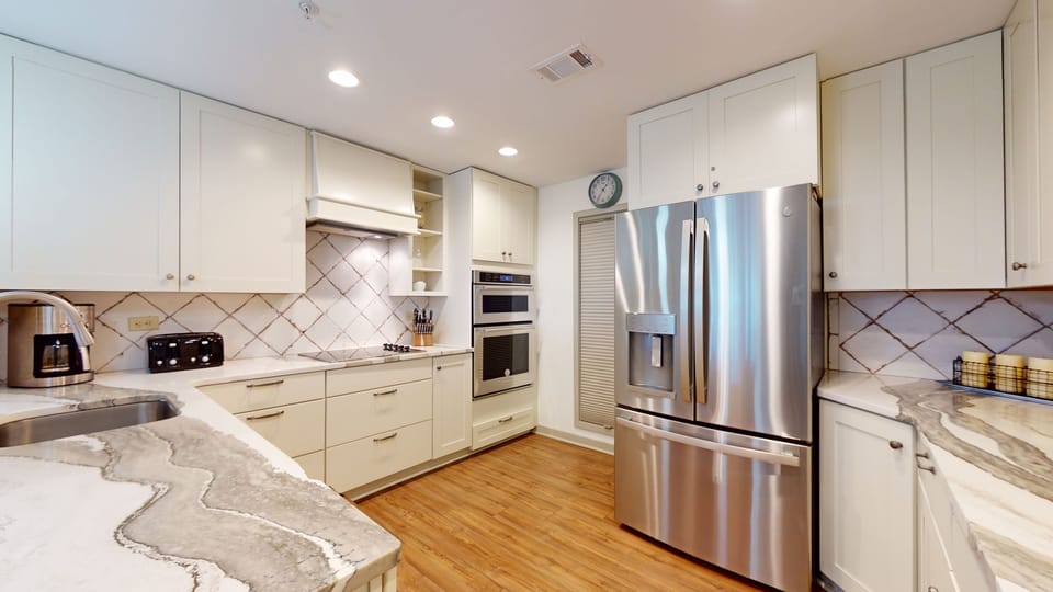 Fully Stocked Kitchen with Quartz Countertops