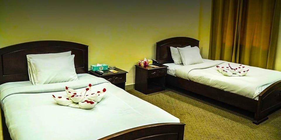 Deluxe Room | Premium bedding, down comforters, desk, laptop workspace