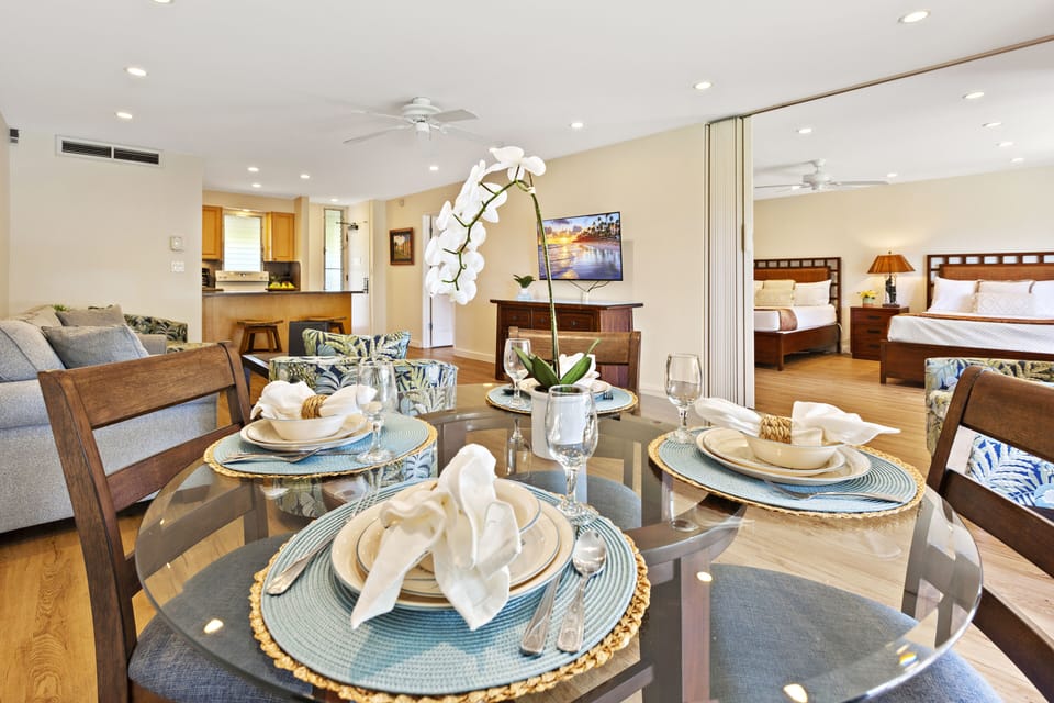Dining Table Close-Up - A bright, welcoming dining space set for a meal, showcasing the open-concept layout.