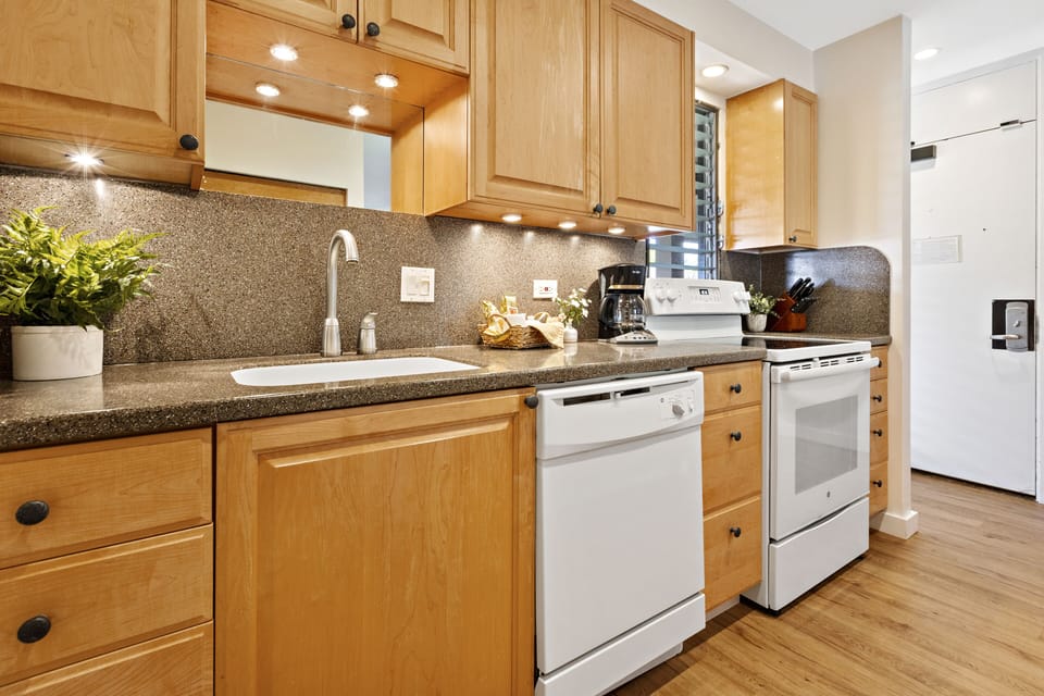 Kitchen - Kitchen with full-size appliances and ample counter space, perfect for home-cooked meals.
