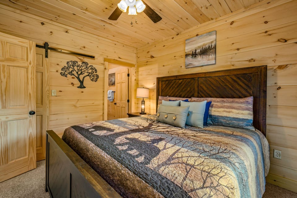 Bed 2: Lower level, King, deck entrance, en-suie bath & TV