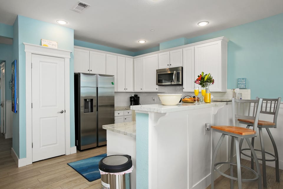 Fully stocked kitchen with all that you'll need to cook family meals. Blender, pots, pans & all cookware included.