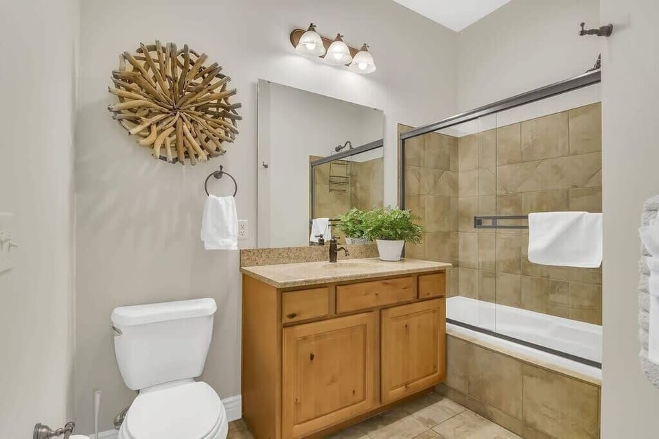 Bathroom 2 features a shower / tub combo!