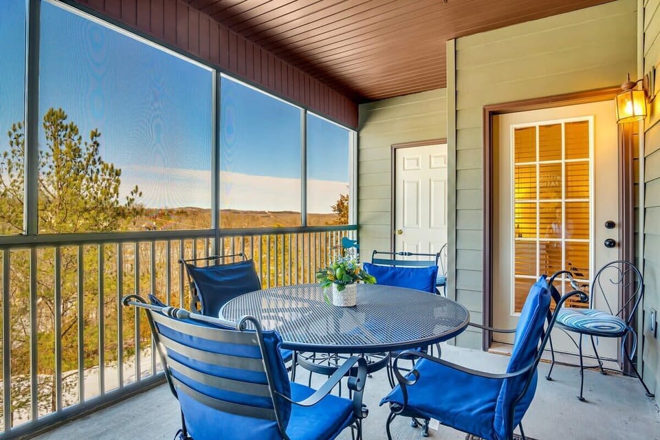 Soak in the Ozarks on the screened-in back porch!