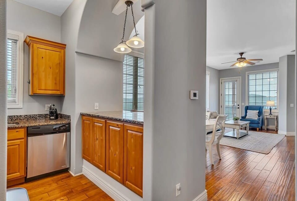 The kitchen is just around the corner from everything.