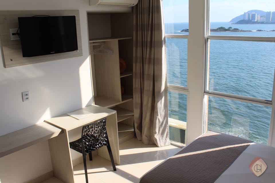 Comfort Triple Room, Beach View | Minibar, blackout drapes, free WiFi, bed sheets