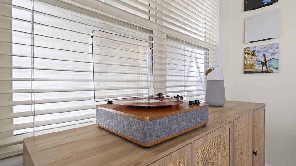 We have a record player and some vinyl albums + a wifi speaker for you to enjoy while on vacation.