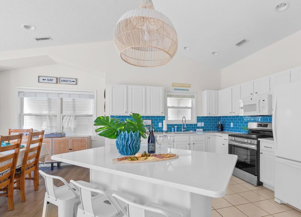 The kitchen is fully stocked with everything you need to cook a meal at home.
