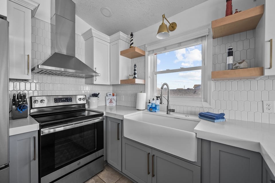 The kitchen is fully stocked with all you need to prepare your meals at home.