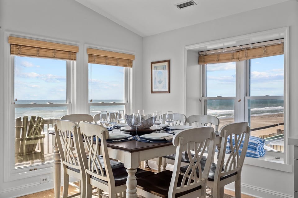 B side upper level dining area with seating for 8 plus 4 counter stools in peninsula