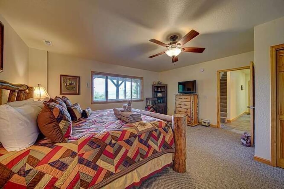 Lower level king bedroom has mountain views