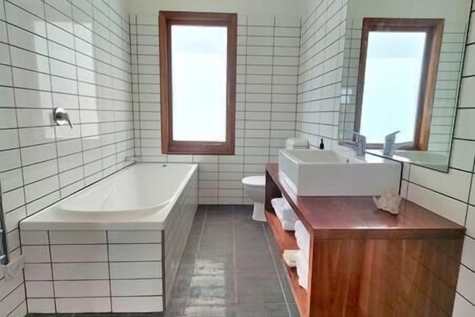 Downstairs bathroom - shower, bath, toilet