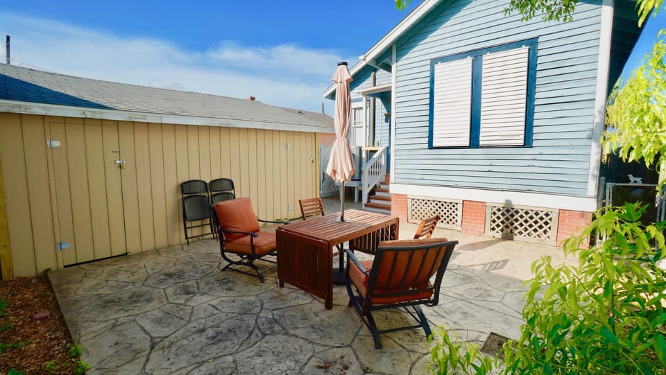 New Stamp back Patio, Extra Chairs and Tables, New Grill is not Shown