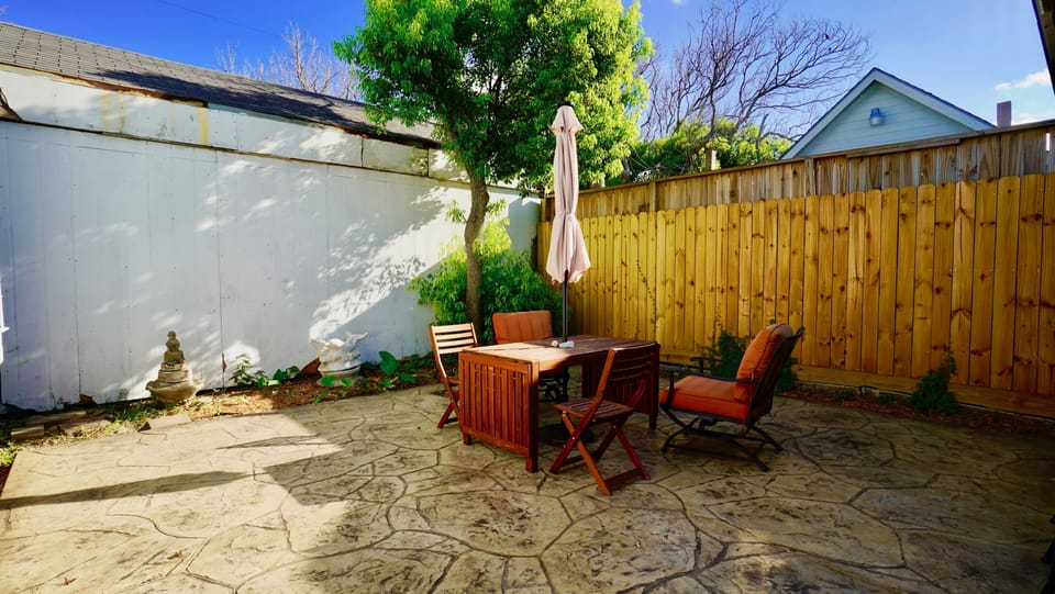 New Stamp back Patio, Extra Chairs and Tables, New Grill is not Shown