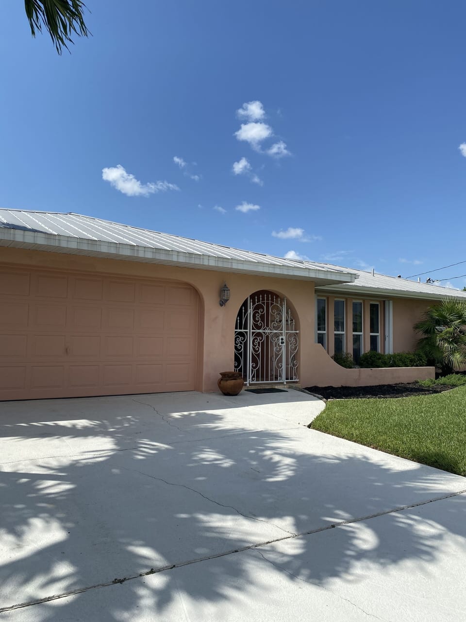 Wide driveway for multiple cars.  Secure entry.