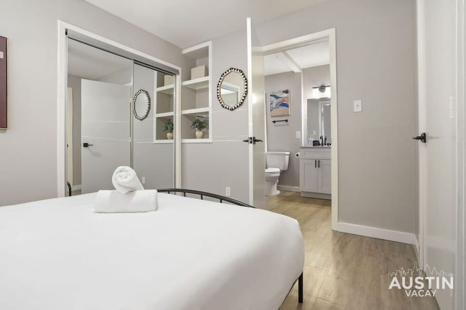Queen bedroom with full length mirror and extra large closet