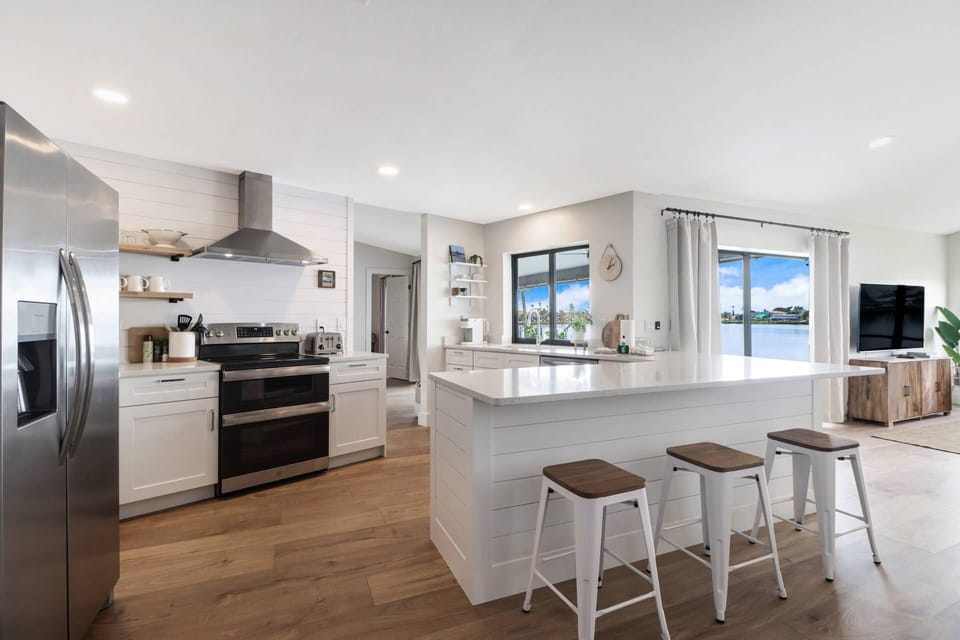 At the heart of the home is this enviable kitchen, which we can all agree, no one will mind spending time in!