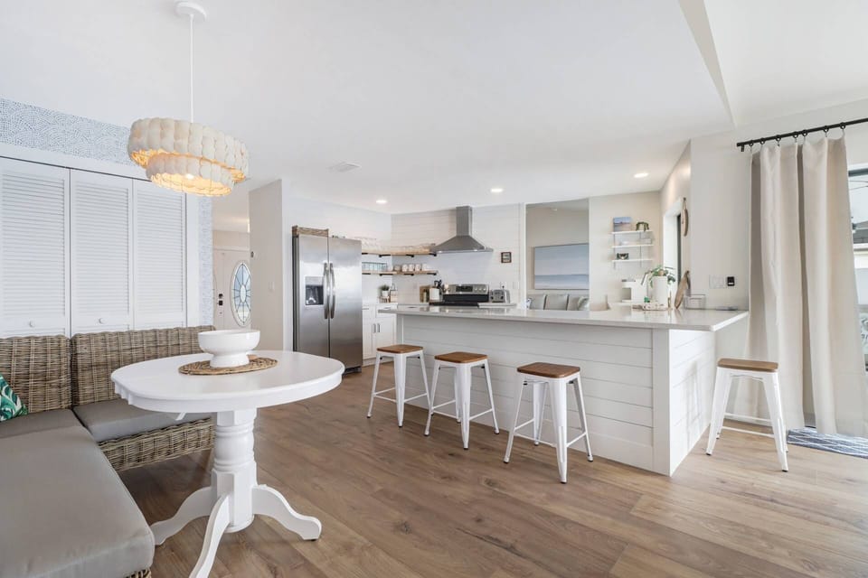 At the back of the home, you find the open family room/kitchen/breakfast nook, a space you're sure to enjoy living in.