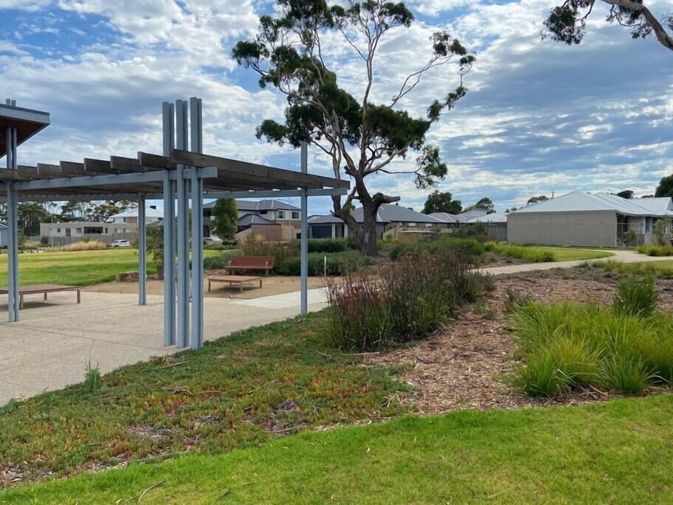 Open parkland on adjacent block
