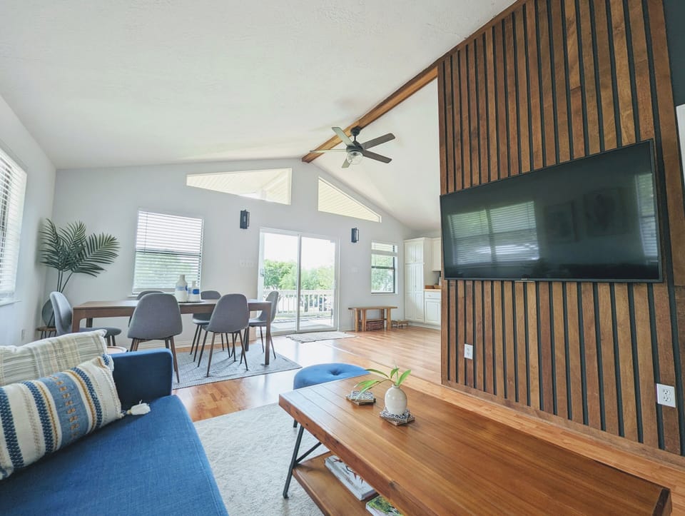 Open concept living, dining, and kitchen areas with wonderful views of the lake!