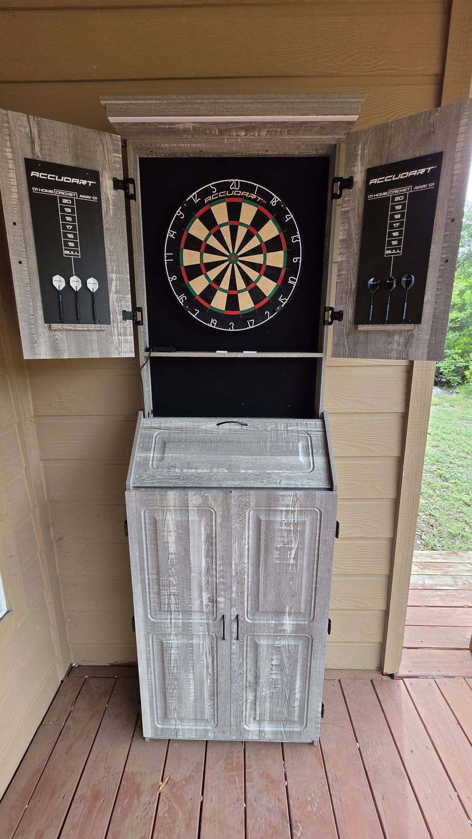 A dartboard has been added outside.