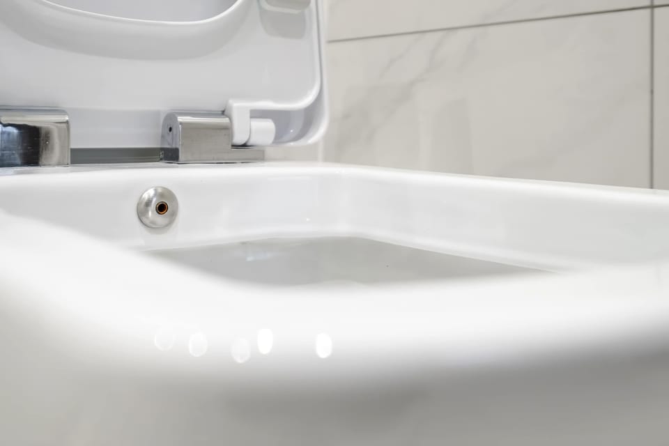 Full Bathroom 1 | Our apartment boasts 3 full bathrooms, each equipped with towels, soaps, and built-in toilet bidets for added convenience and comfort.